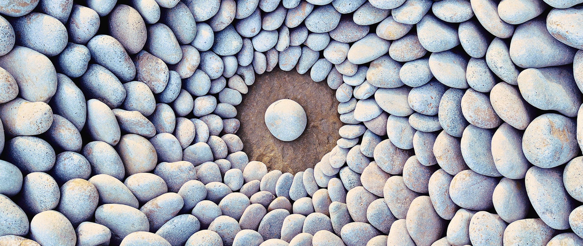 Sea stones arranged on the beach